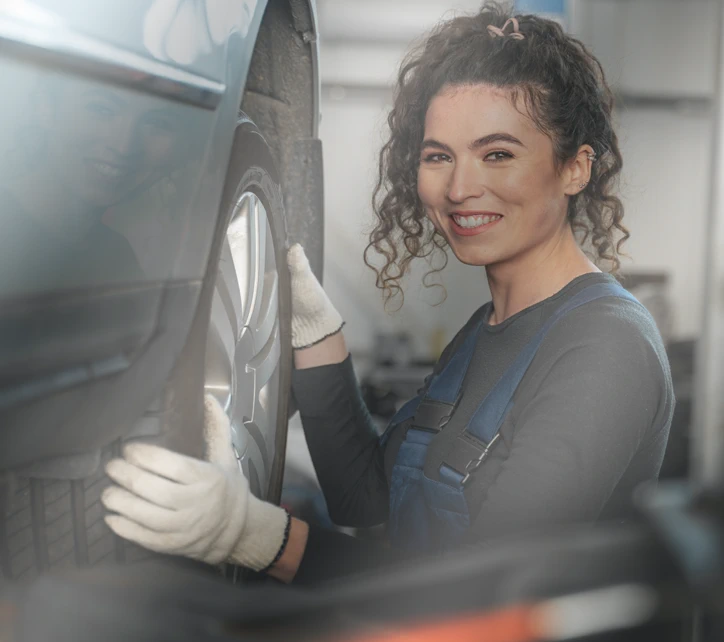 Countryside Auto Care technician smiling in the Blackfoot repair shop